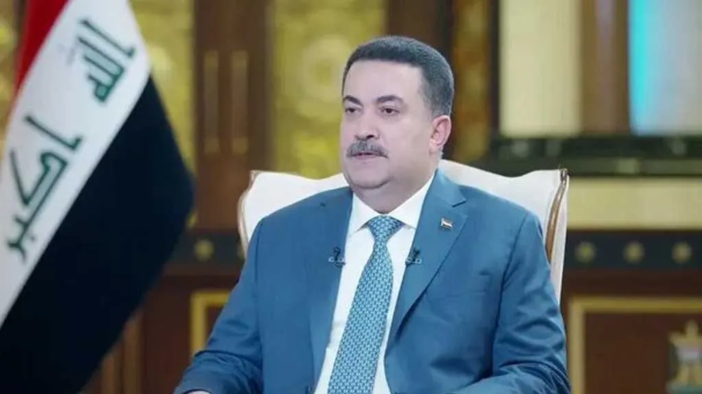 نخست وزیر عراق محمد شیاع السودانی در حال سخنرانی درباره روابط خارجی عراق